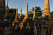 Inle Lake Myanmar. Indein, on the summit of a hill the  Shwe Inn Thein Paya a cluster of hundreds of ancient stupas. Many of them are ruined and overgrown with bushes. 